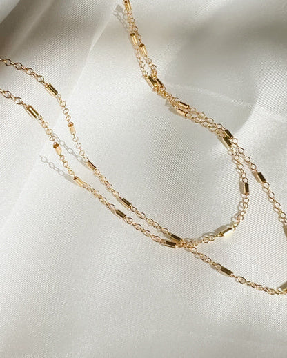 16-inch gold-filled everyday chain necklace styled on the neck — the Joleigh by Saddle & Stone